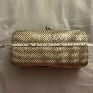 Silver metallic clutch purse